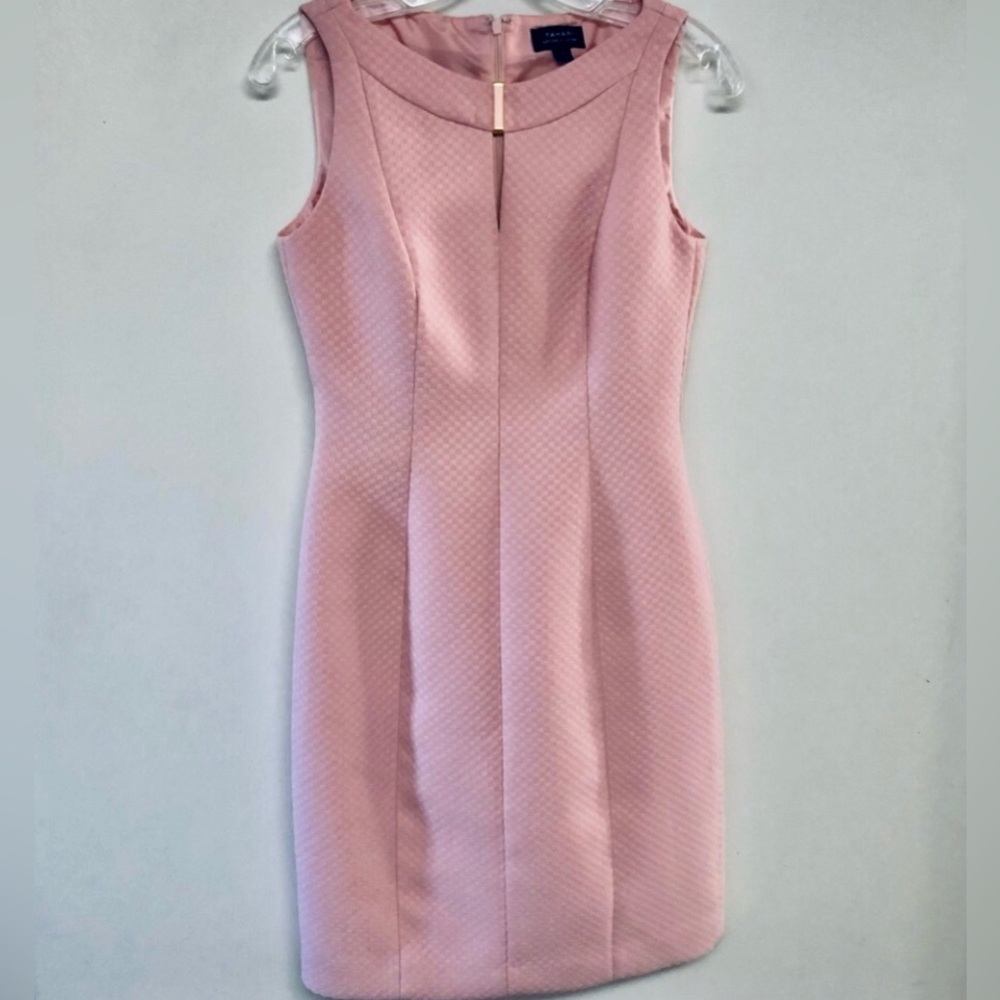Light pink Tahari sheath dress with darting and gold metal detail